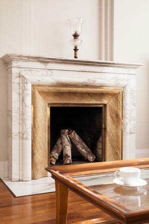 When is the best time to clean a stone fireplace?